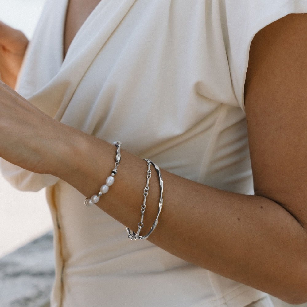 Figaro Silver-Tone Knot Chain Bracelet
