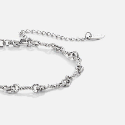 Figaro Silver-Tone Knot Chain Bracelet