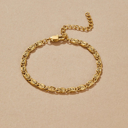 Gold-Tone Swirl Link Chain Bracelet